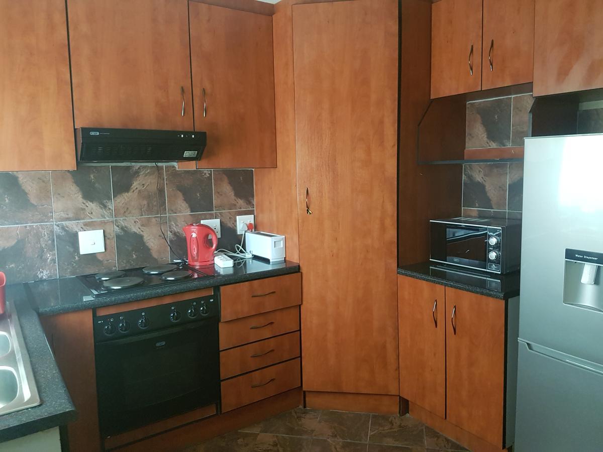 SimbaSun Cottages Midrand Esterno foto